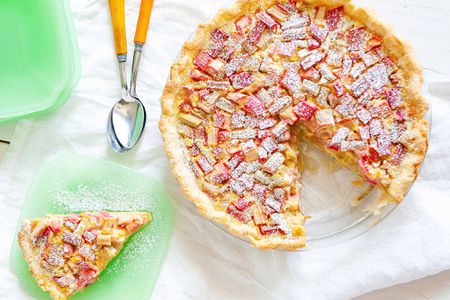 Rhubarb Pie Recipe - - rhubarb pie with powdered sugar on top