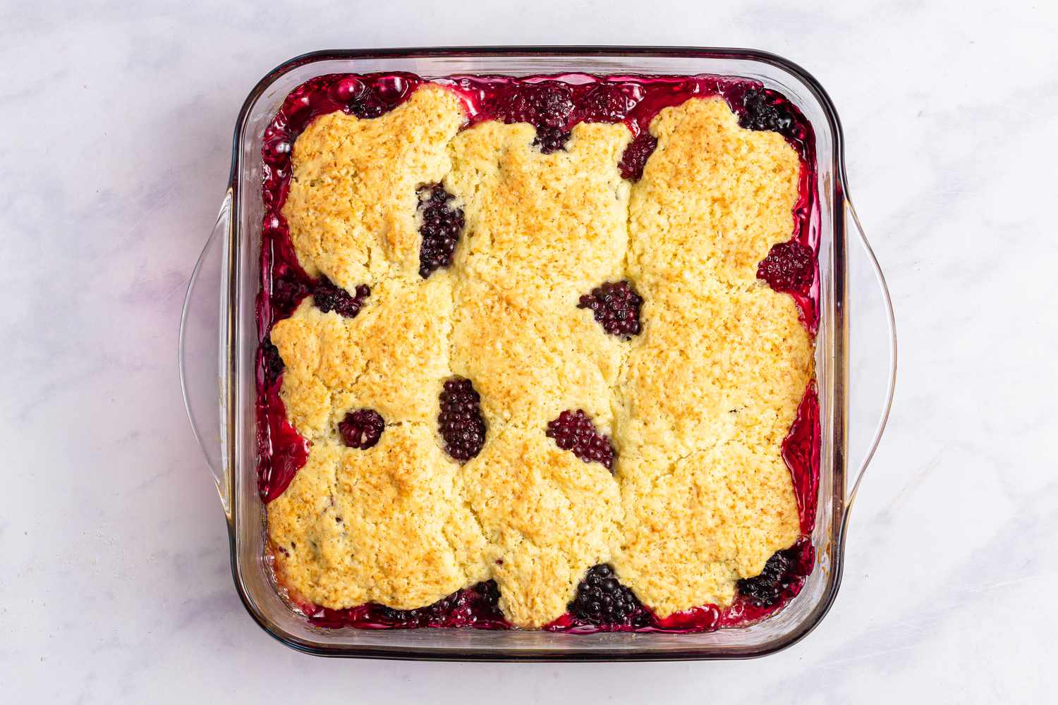 Overhead view of a blackberry cobbler.
