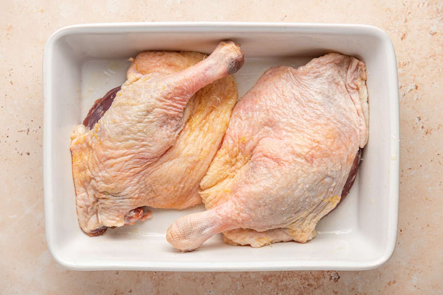 Duck Legs in Casserole Dish for Easy Duck Confit Recipe