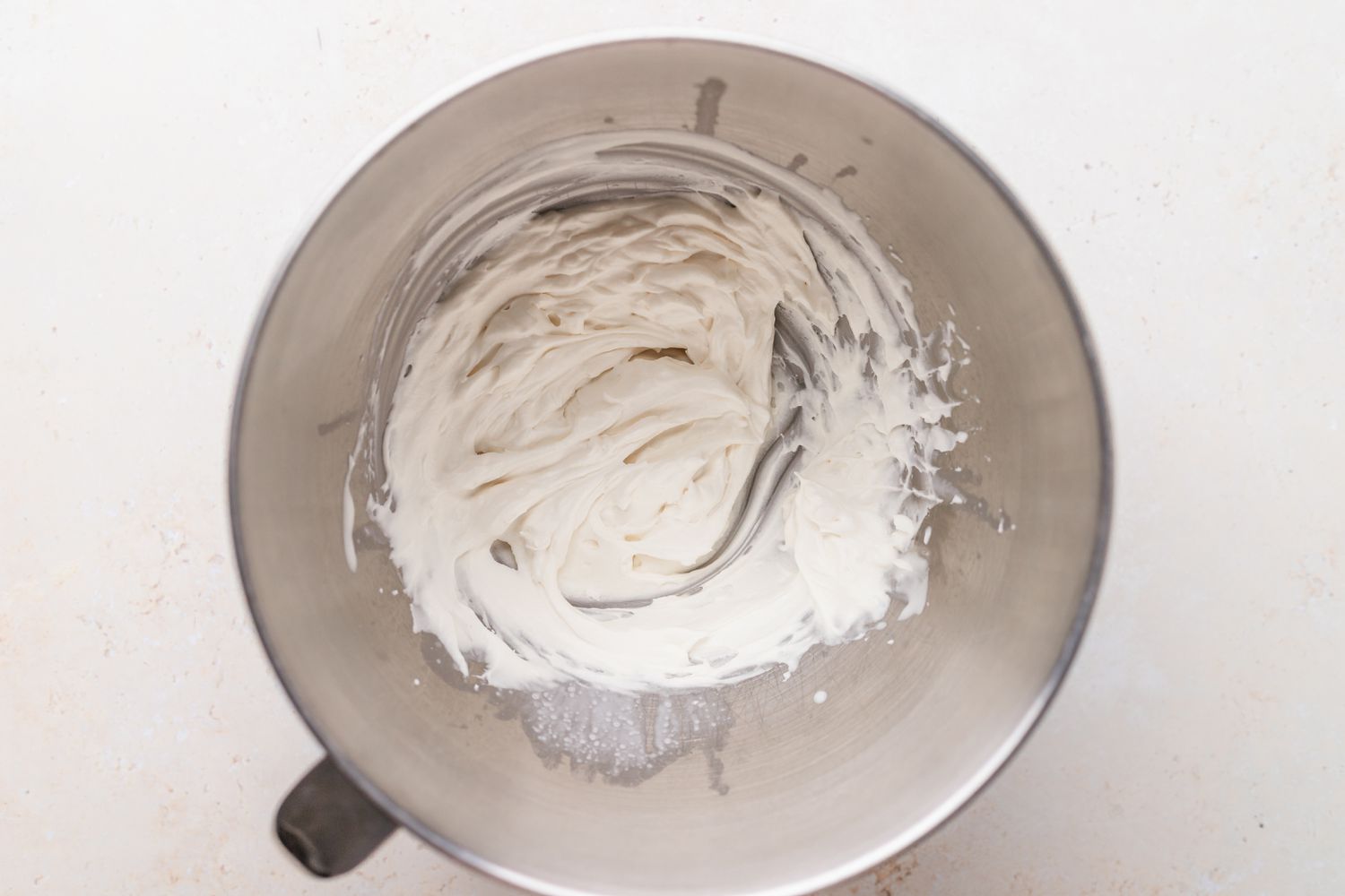 Whipped cream in bowl.