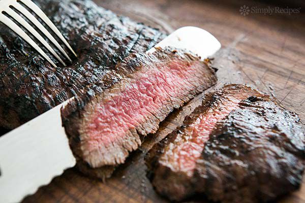 Slicing perfectly grilled flank steak