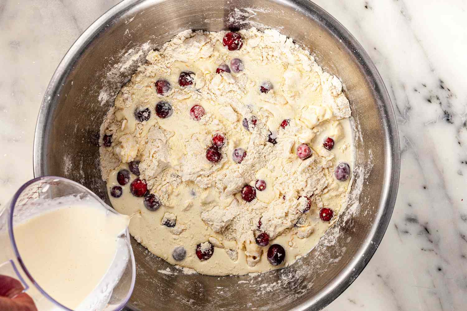 Add heavy cream to dry ingredients.