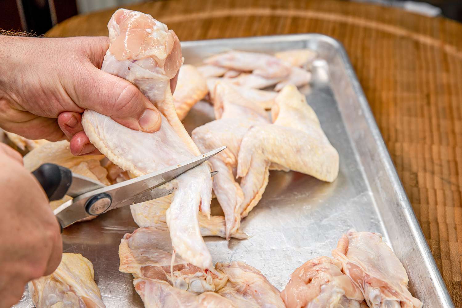 Prepare Wings with Sharp Scissors for Smoked Wings Recipe