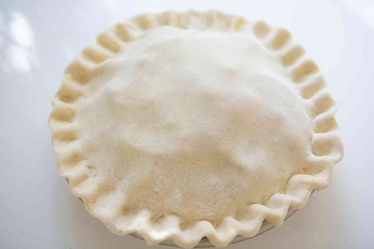 top apple cranberry pie with second pie crust