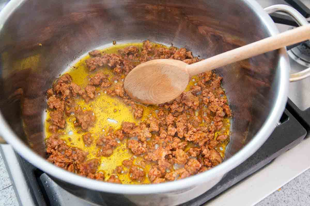 cook chorizo for sopa seca de fideo until fat is rendered