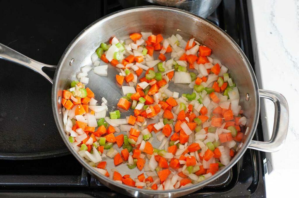 Cook onions carrots and celery for easy and healthy shepherd's pie recipe