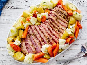 Instant Pot corned beef and cabbage sliced on a platter