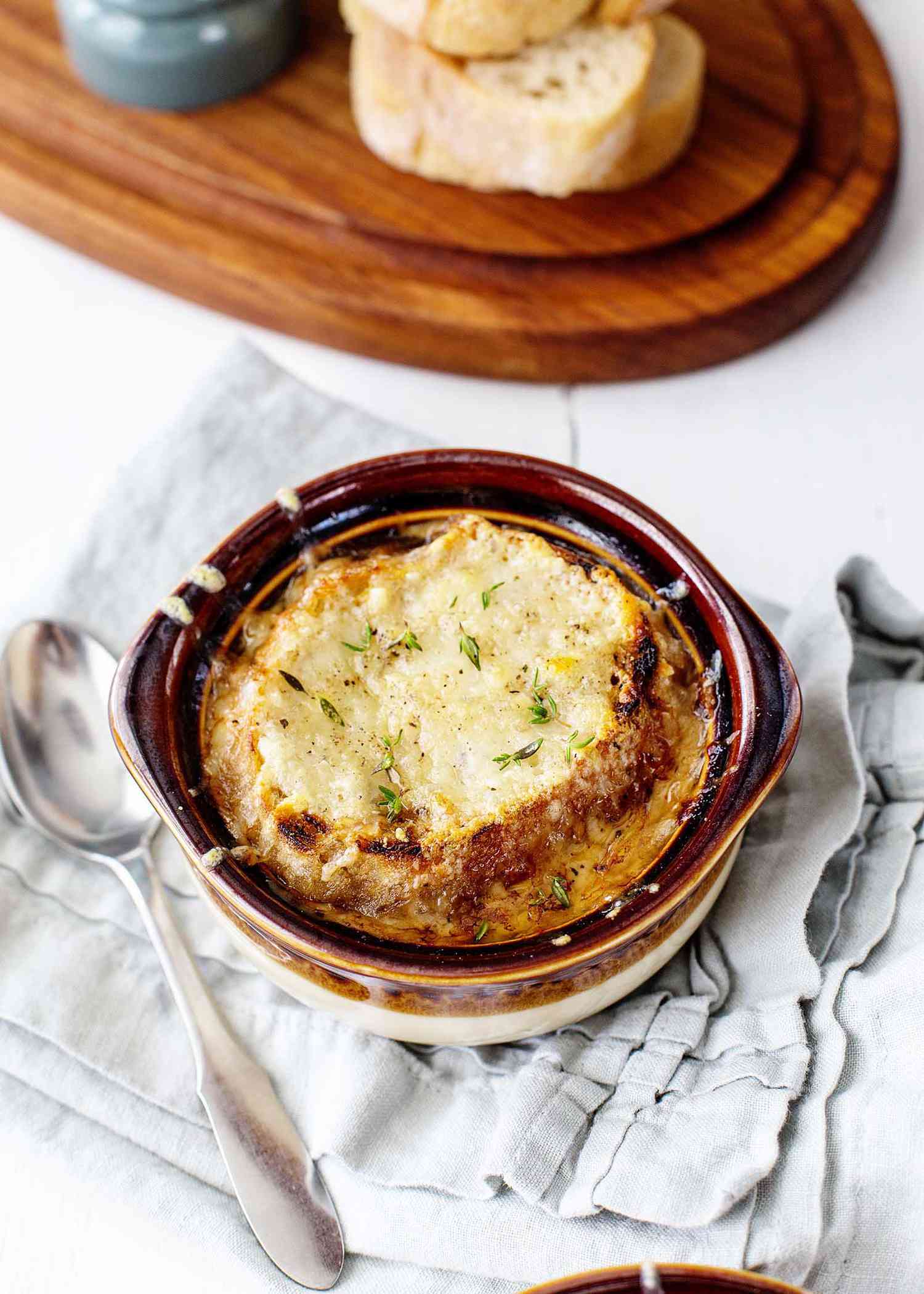 A bowl of French onion soup ready to eat