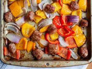 Overhead view of a sheet pan sausage dinner.