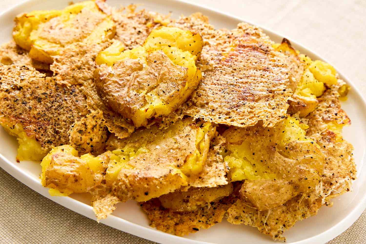 Crispy Parmesan Smashed Potatoes on a platter