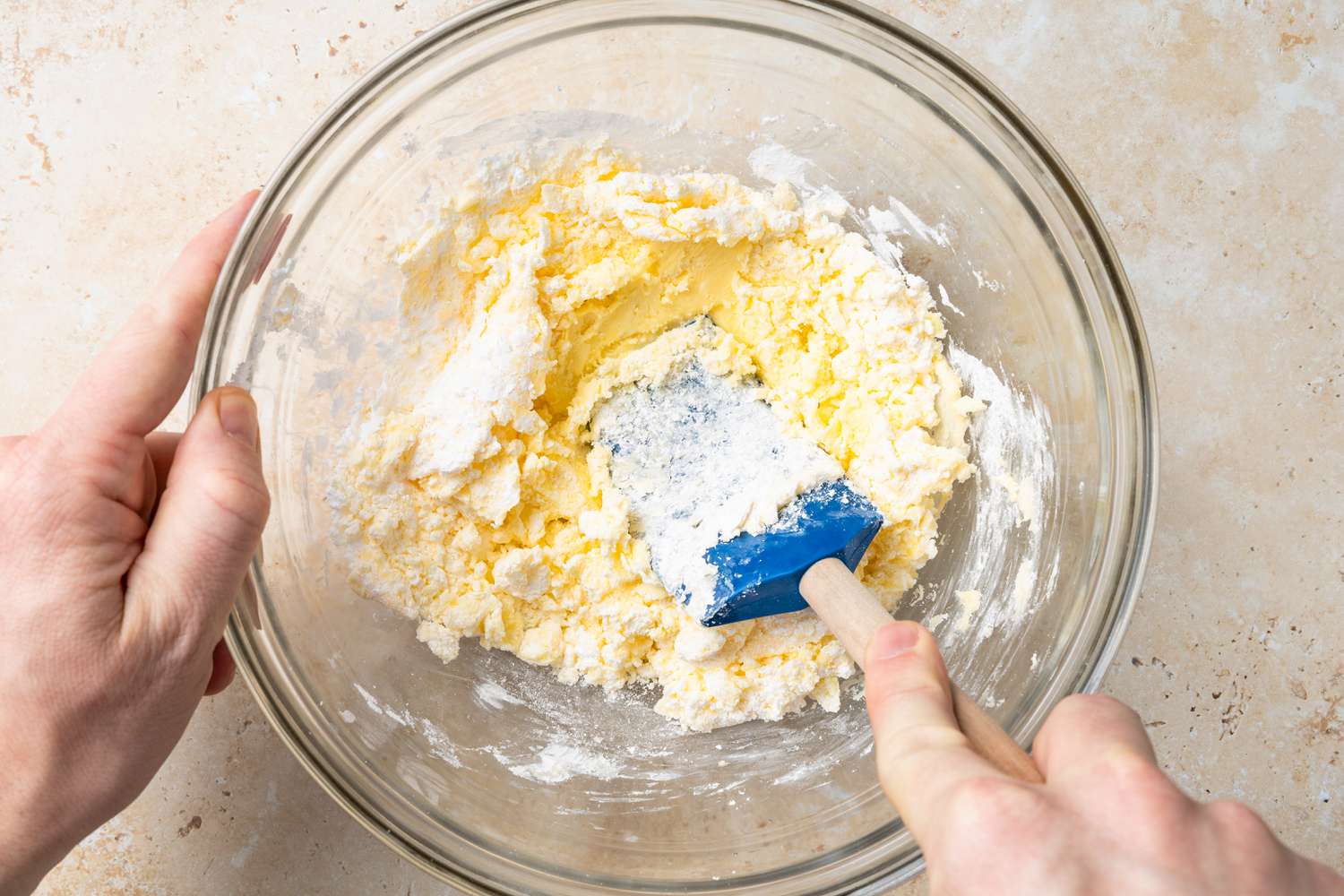 Powdered Sugar and Butter Folded Together Using a Rubber Spatula for Frangipane Croissant Recipe