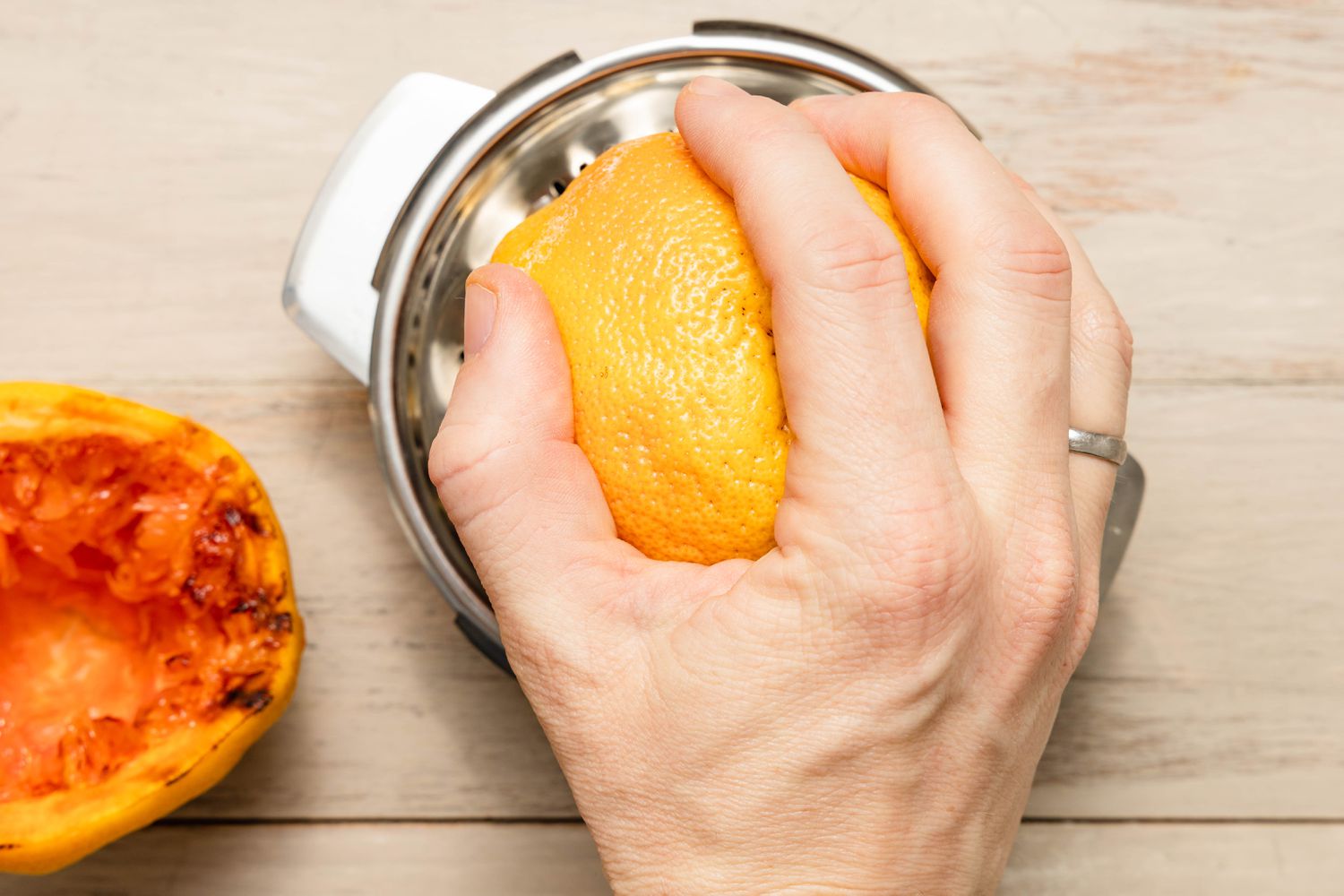 Grilled Grapefruit Juiced Using the Tabletop Juicer for Smoked Citrus Paloma Recipe