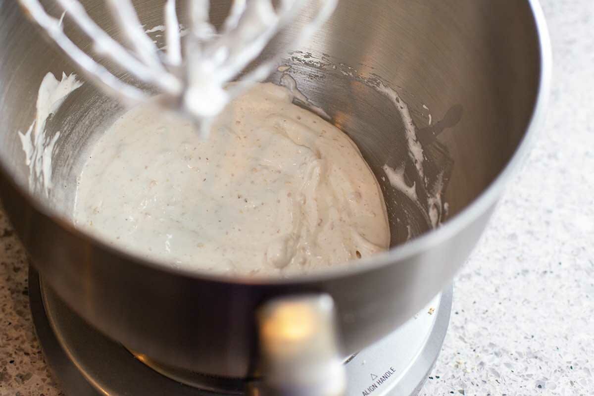 Whipped egg whites to make Butterhorn Cookies Filled with Walnut Meringue.