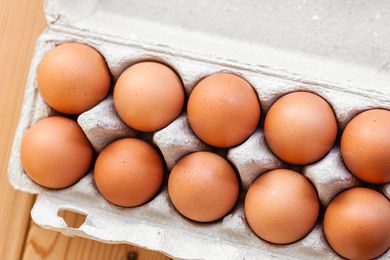 Brown eggs in an egg carton