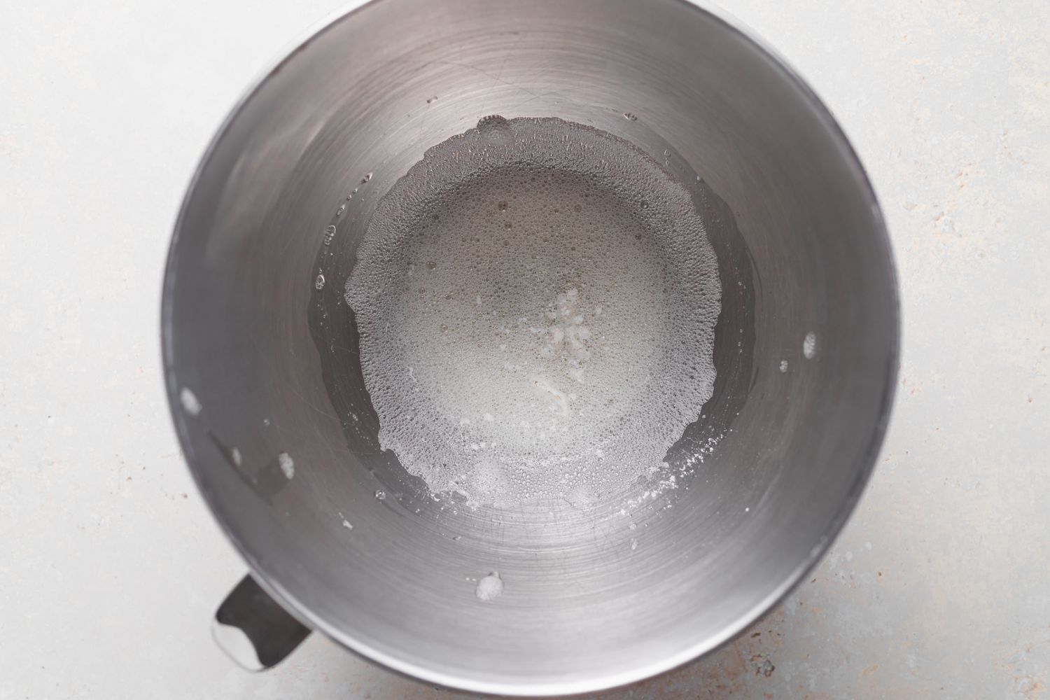 Whipping egg whites to make french macarons.