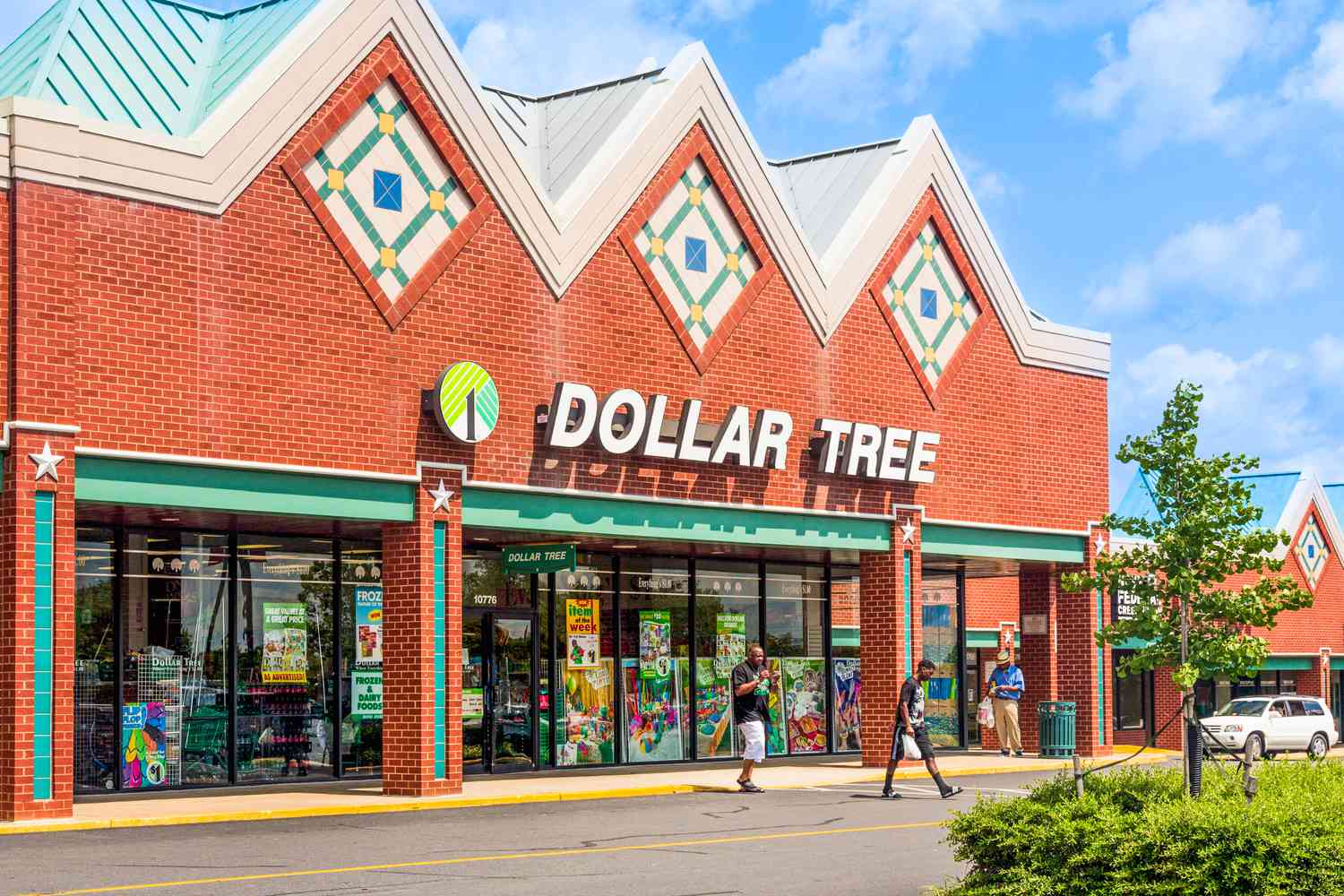 Dollar Tree store exterior with people at the entrance