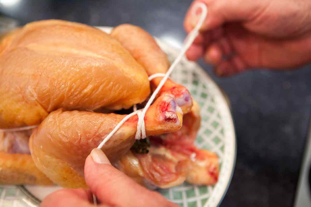 How to roast chicken - truss the chicken