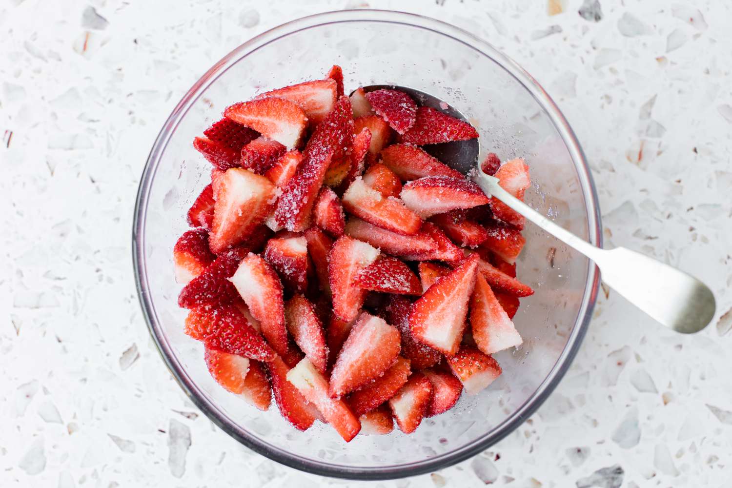 Cut Strawberries Macerated with Sugar in a Bowlfor Easy Strawberry Shortcake Recipe