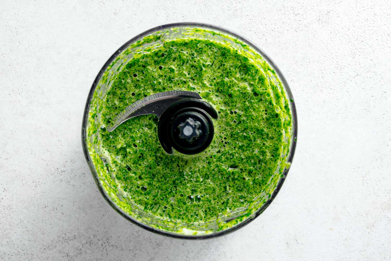 Smooth Herb Mixture in a Food Processor for Microwave Arroz Verde Recipe