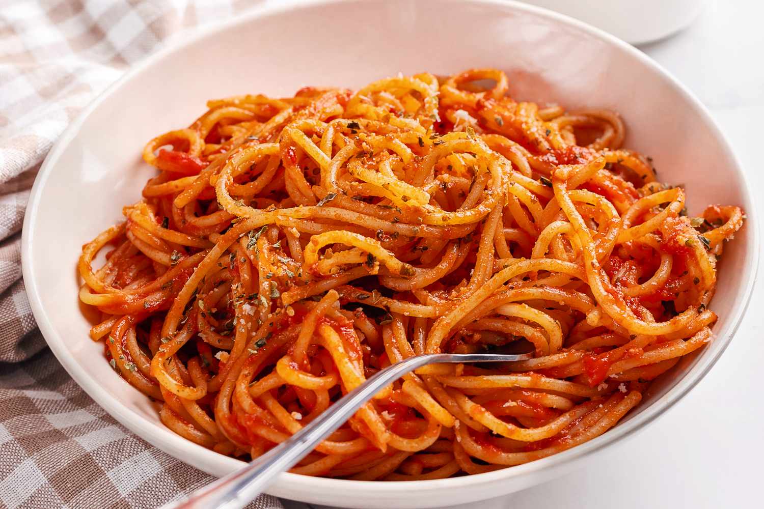 Closeup of a bowl of spaghetti with tomato sauce