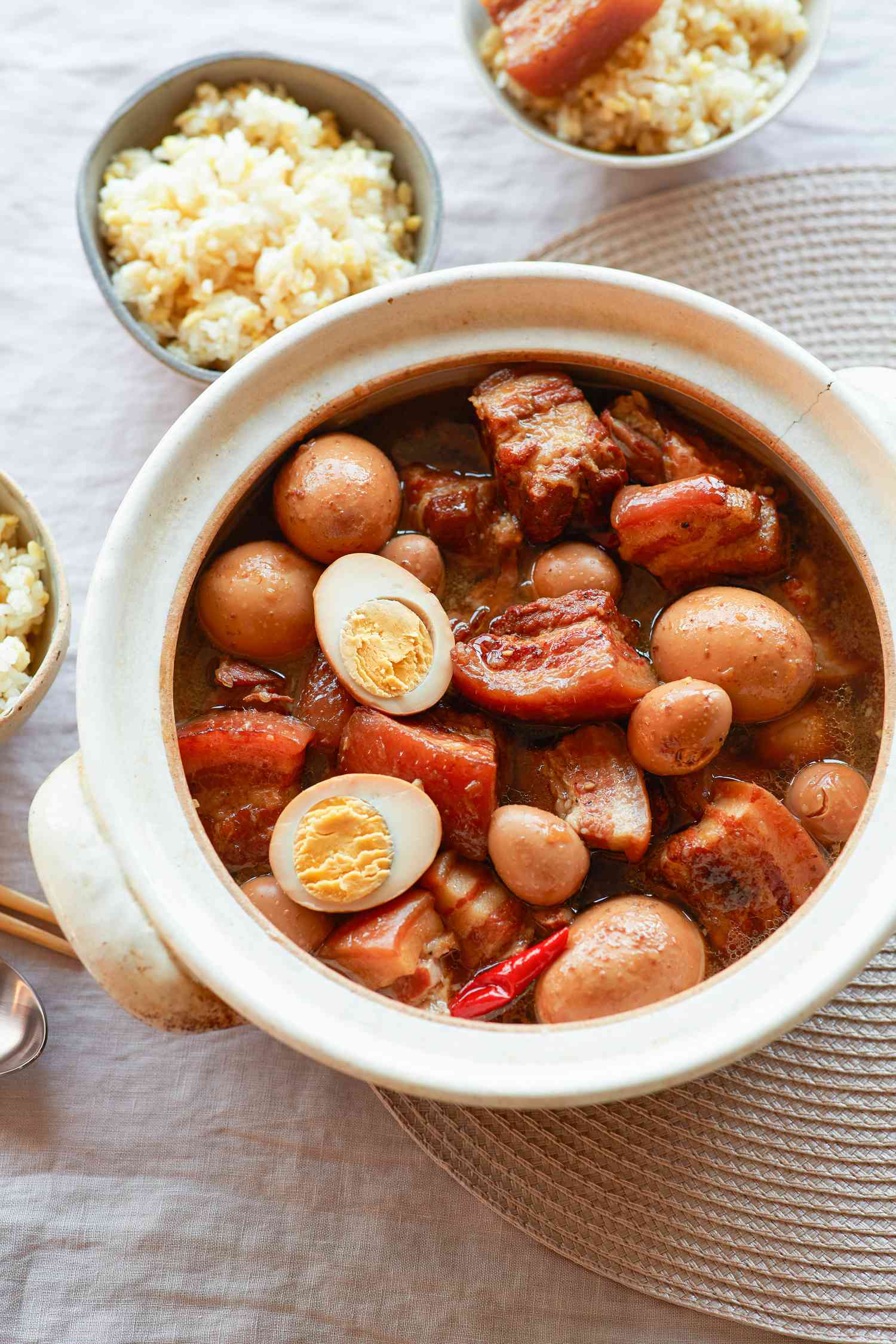 Overhead view of a pot of Sweet and savory braised pork belly.