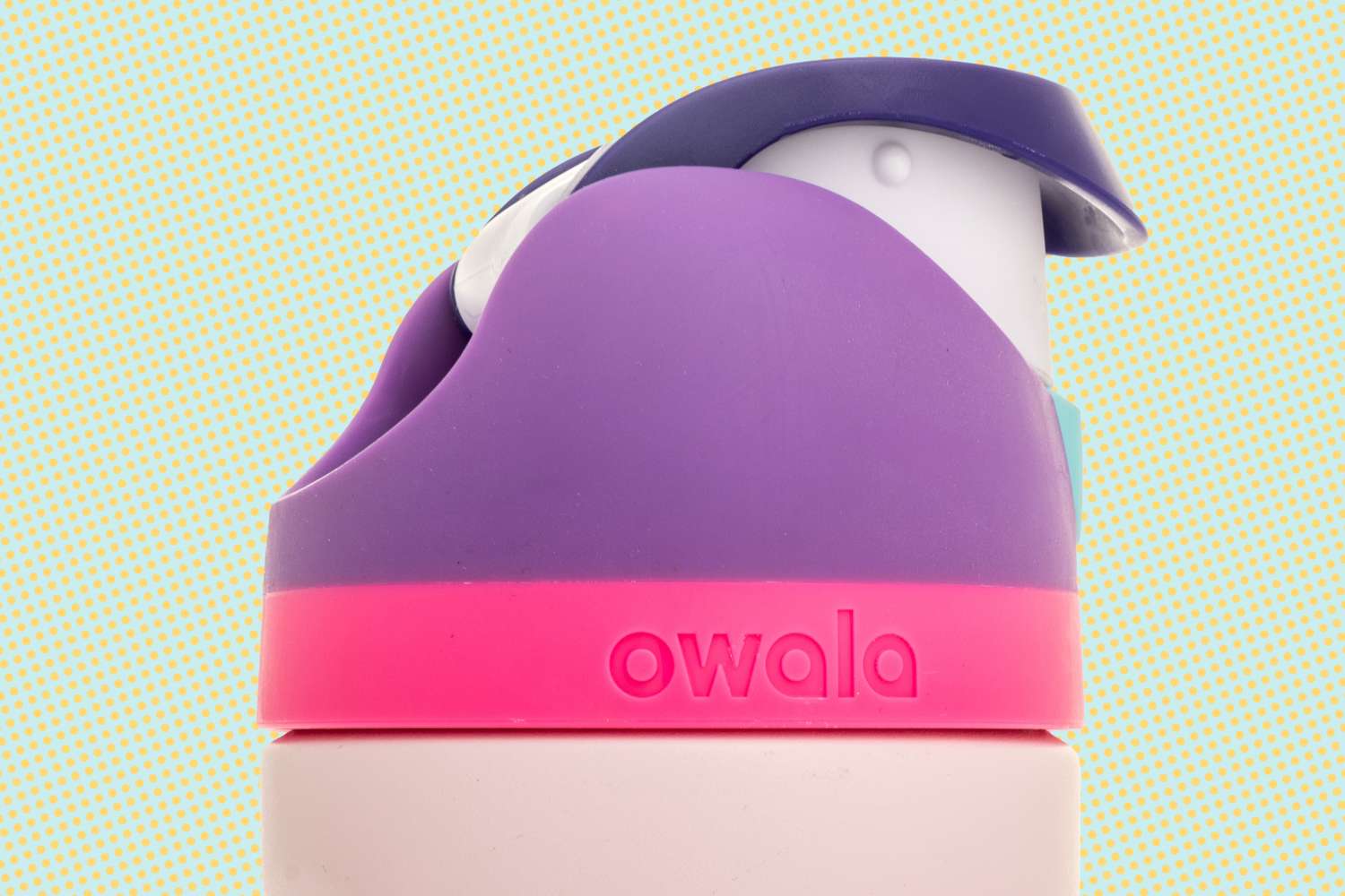 A bottle of Owala leak proof built in straw tumbler on an isolated background.