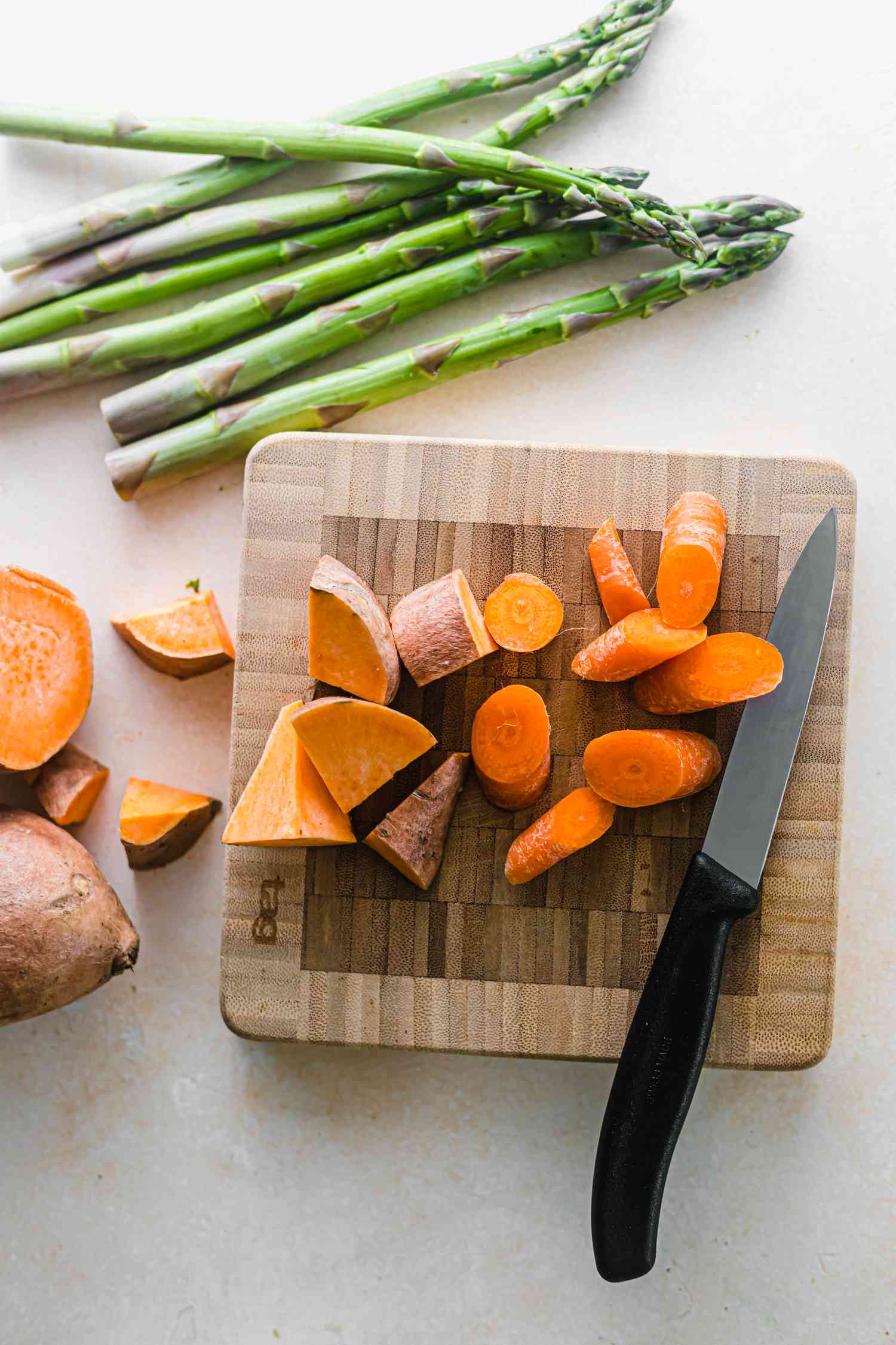 Chopped sweet potatoes carrots asparagus how to roast vegetables