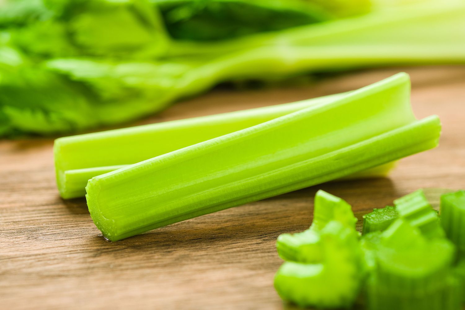 chopped celery on a cutting board