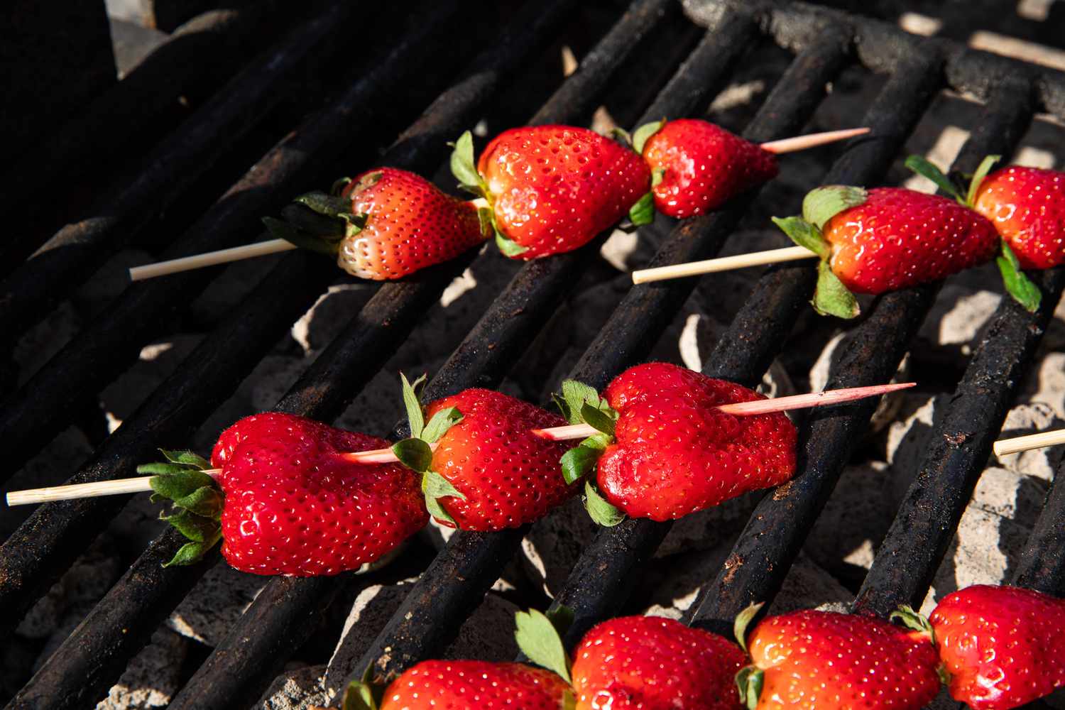 Skewered Strawberries on a Grill for Grilled Banana Split Recipe