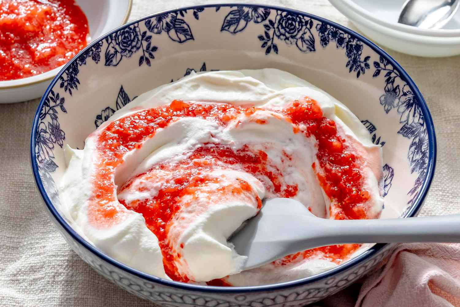 Summer Berry Fool Recipe (3 Ingredients, No-Cook) in a large bowl with a rubber spatula