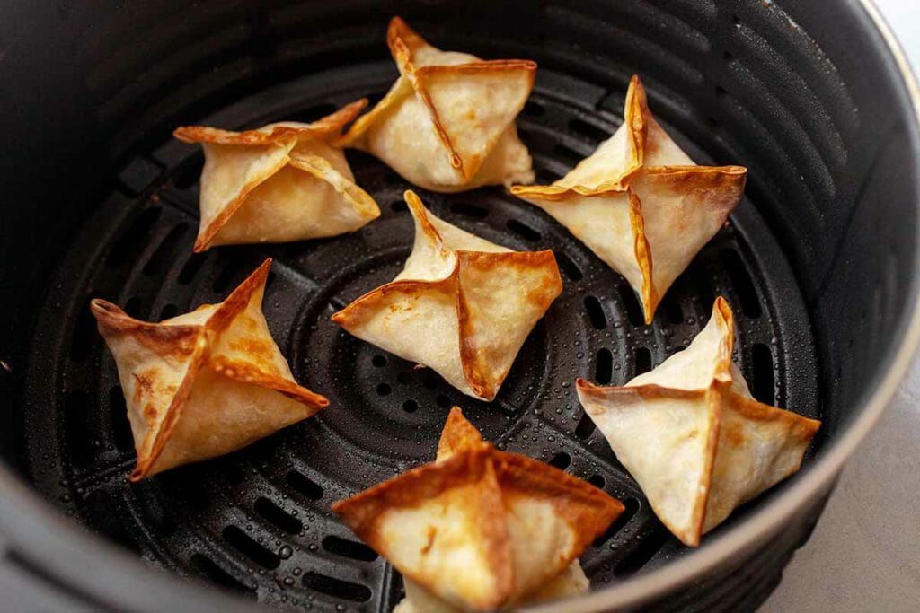 Crispy homemade cream cheese wontons after frying in the air fryer
