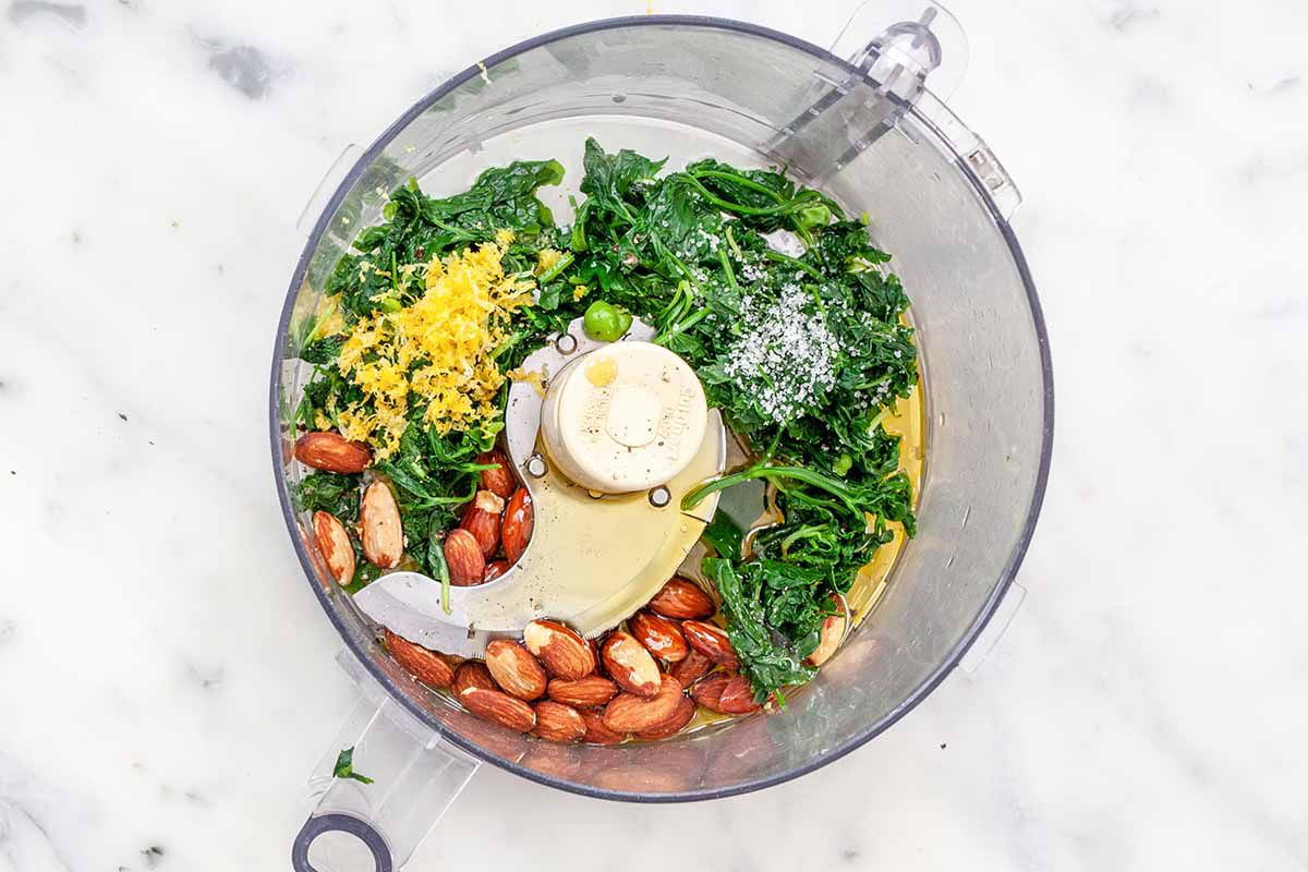 Parsley Mint Pesto - ingredients for pesto in a food processor waiting to be pulverized