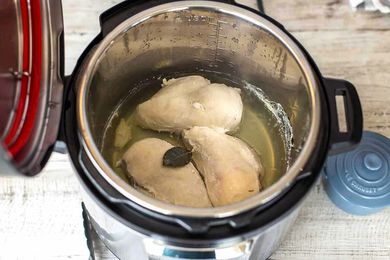 Three cooked chicken breasts in the instant pot
