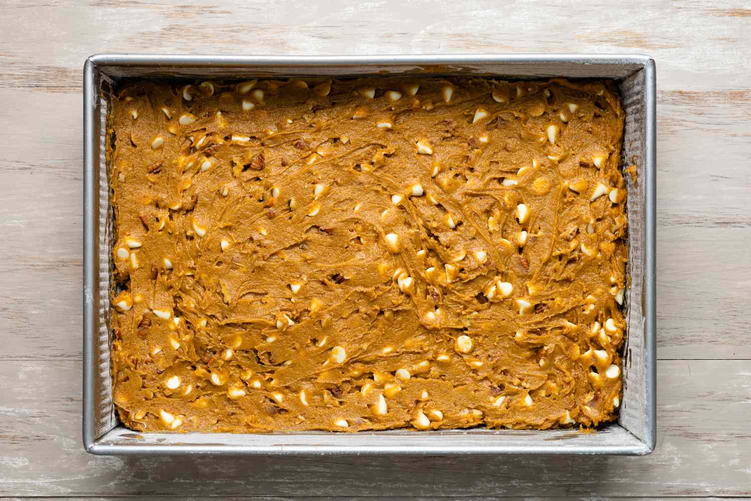 Pumpkin Blondies Batter in a Baking Pan