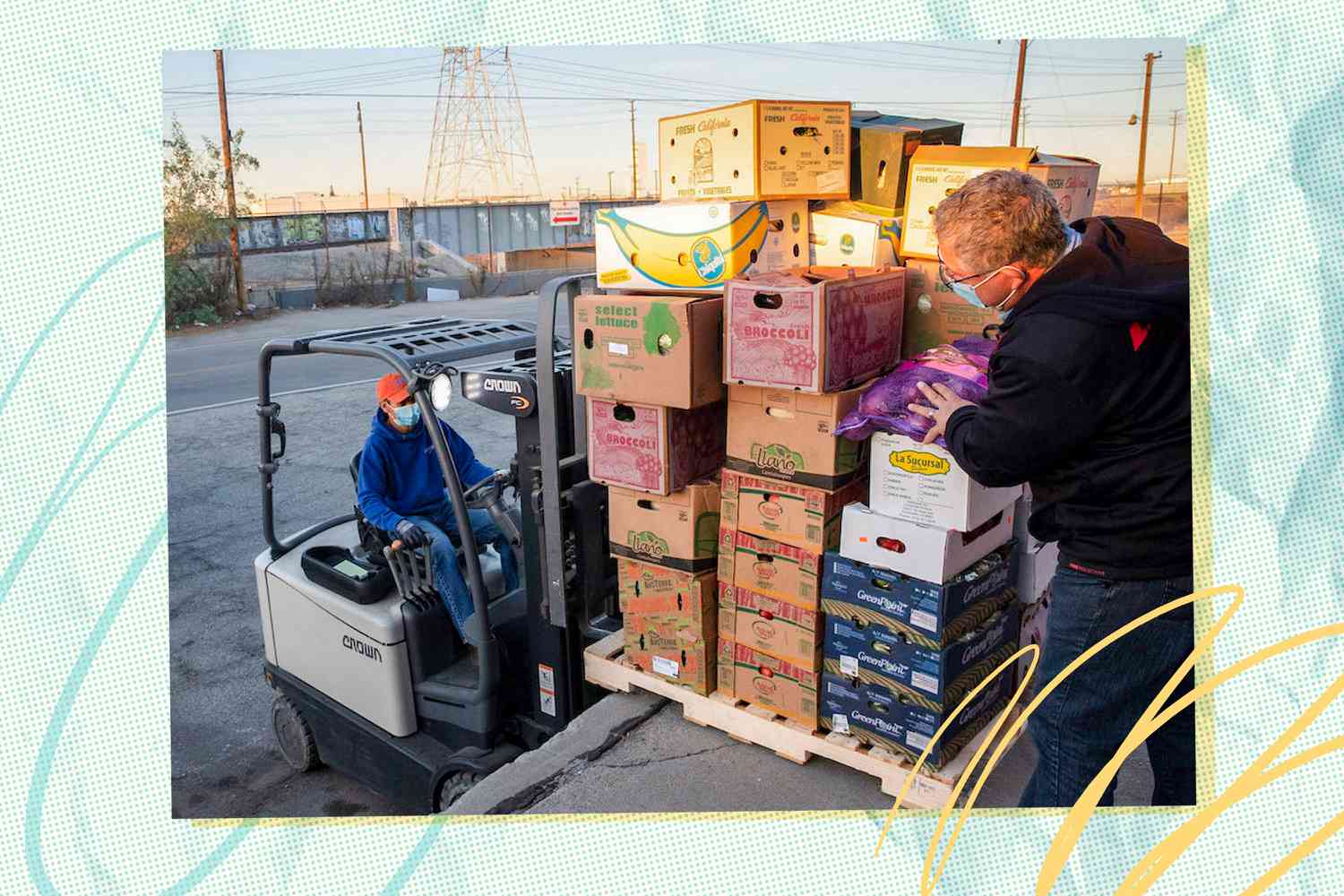 Two people moving boxes with a forklift 
