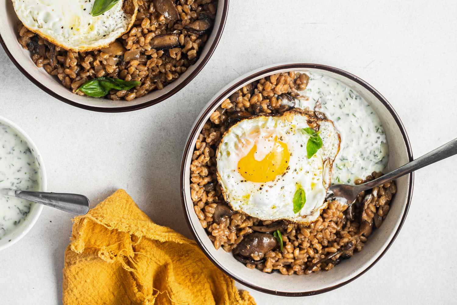 Farro, Mushroom, and Egg Grain Bowls with Utensils