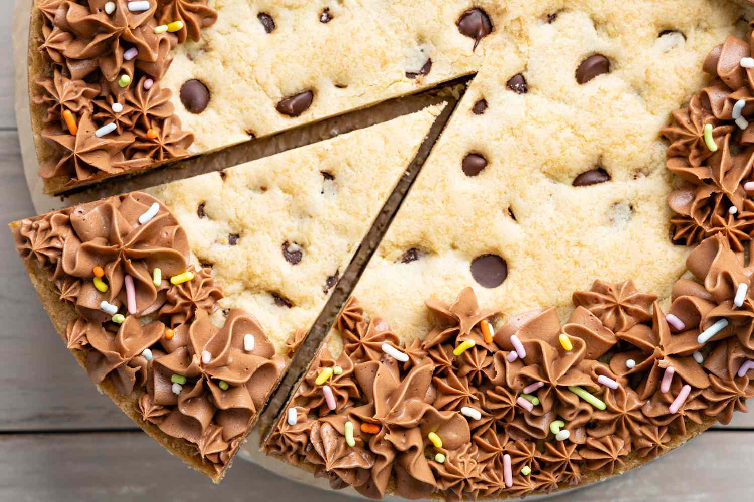 Chocolate Chip Cookie Cake with a Slice Cut