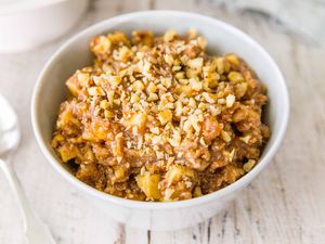 How to Make Charoset - charoset in white bowl on wooden table