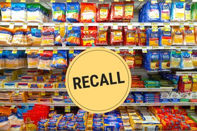 Supermarket cheese section with a recall alert badge displayed