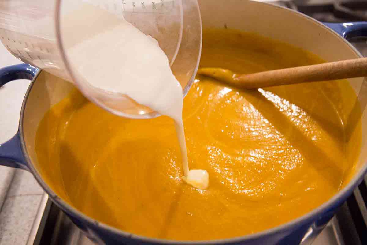 add milk and cream to pumpkin soup