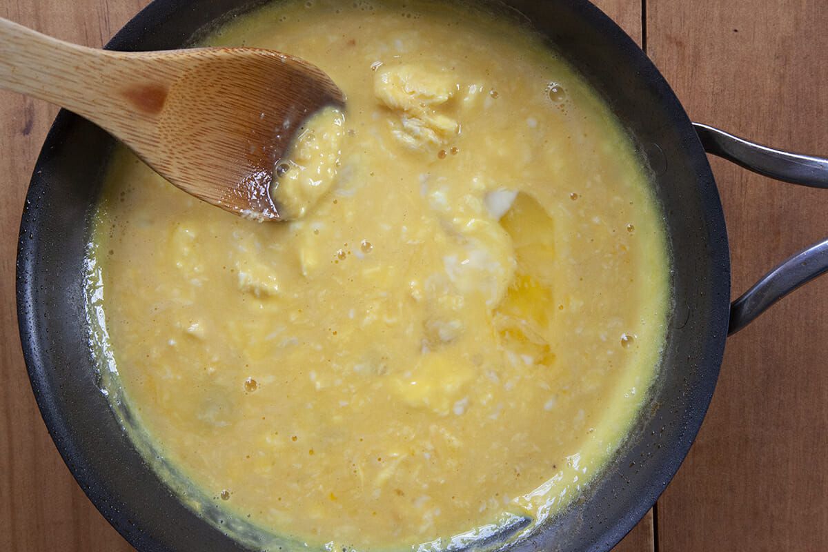 Egg Breakfast Tacos with Chorizo add the eggs