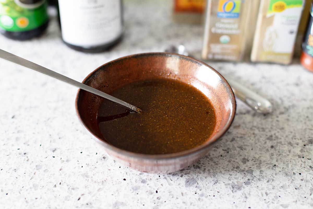 Ingredients mixed together for a balsamic marinade for steaks.