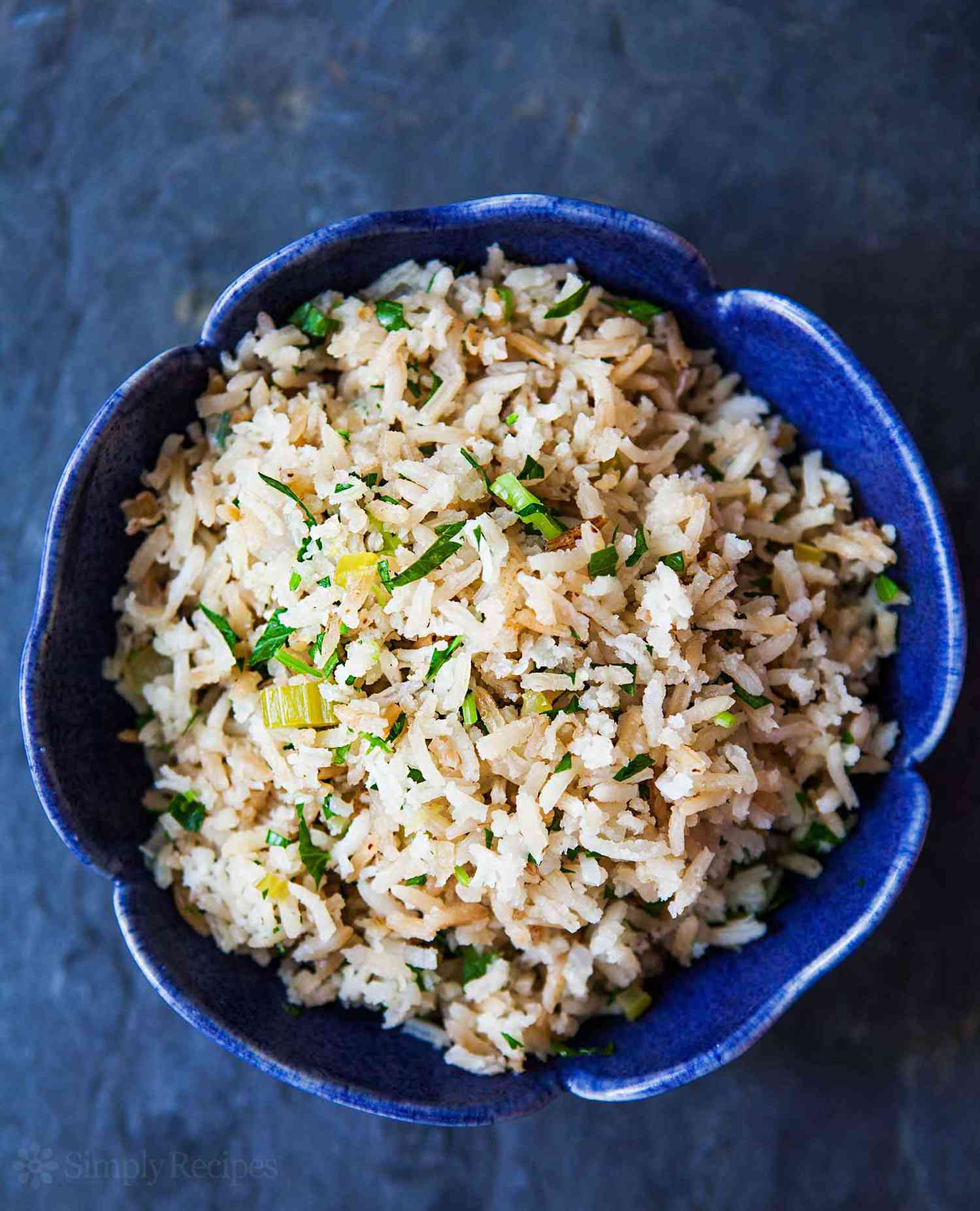 A bowl of rice pilaf with herbs