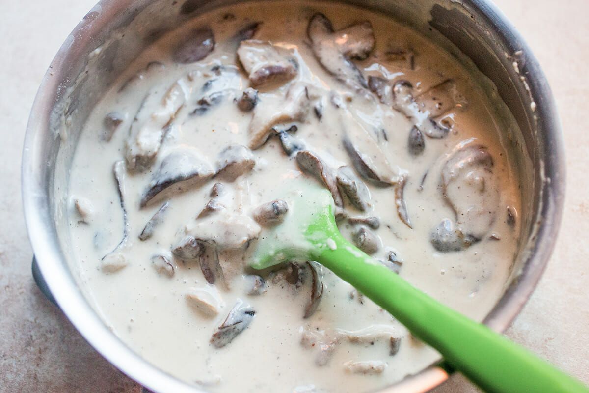 Fettucine Alfredo with Mushrooms making alfredo sauce