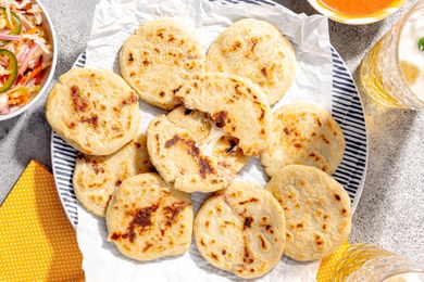 Plate of Pupusas with One Cut in Half