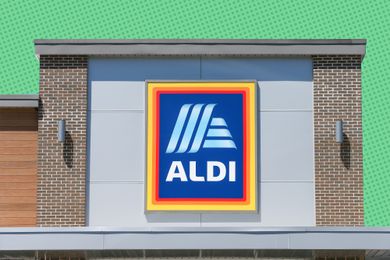 Aldi store-front with a green polka-dotted background 
