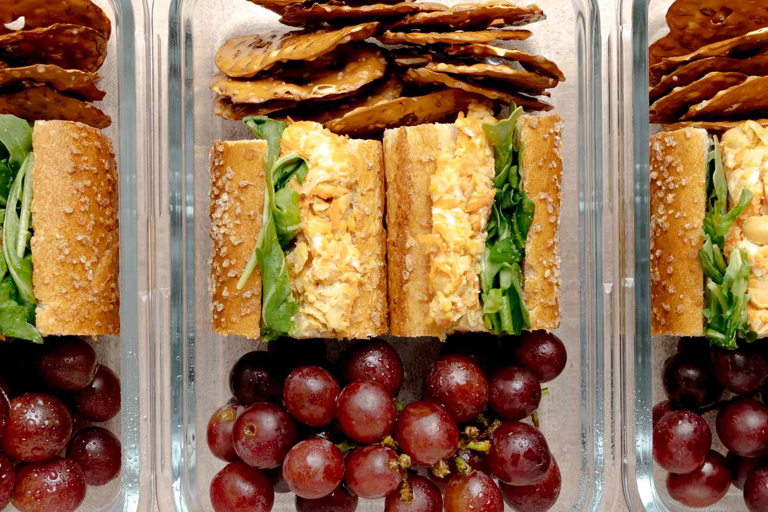 Chickpea Panini in a Lunchbox with Grapes and Pretzel Crisps