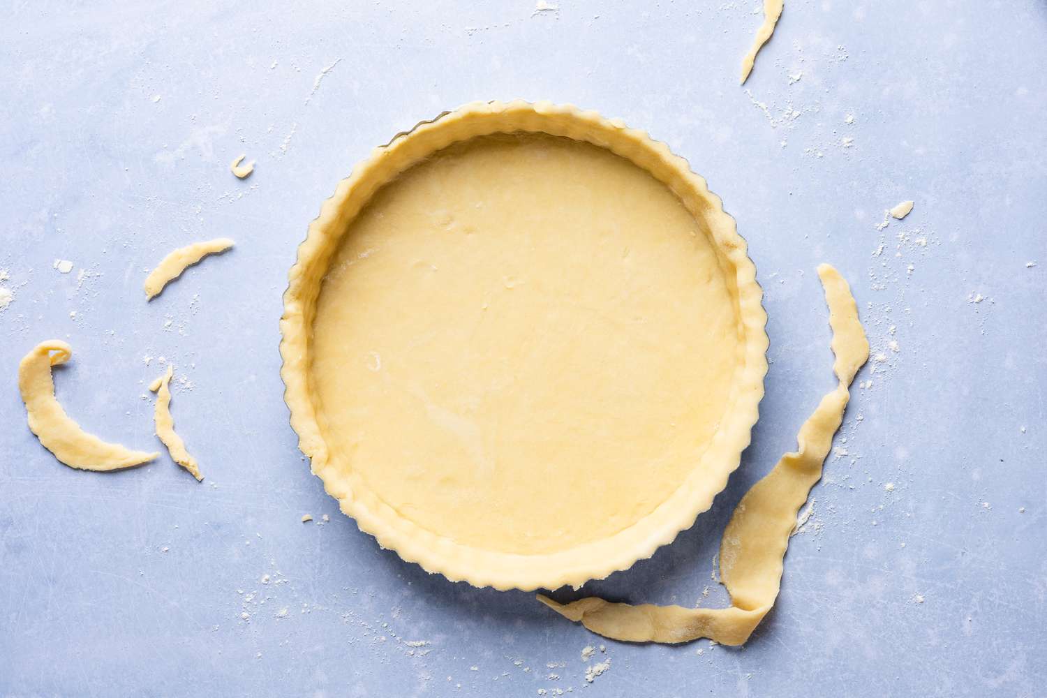 shortcrust pastry in the tart pan (after excess is cut off edges) for cornflake tart recipe