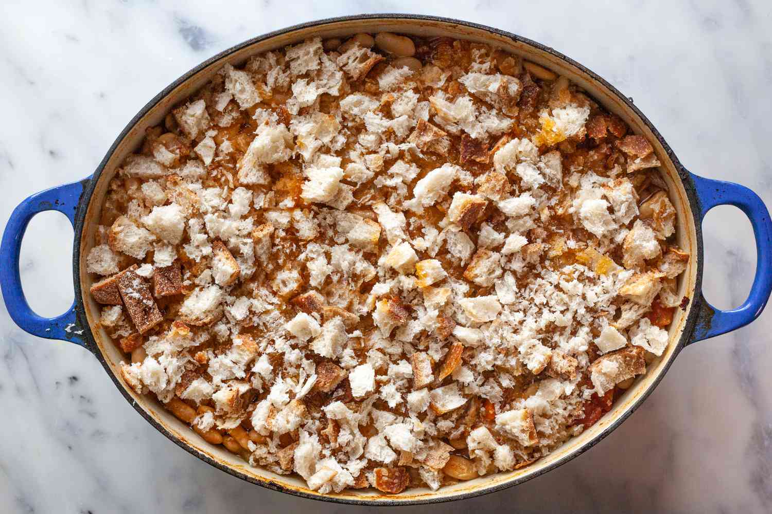 Top cassoulet with fresh breadcrumbs.