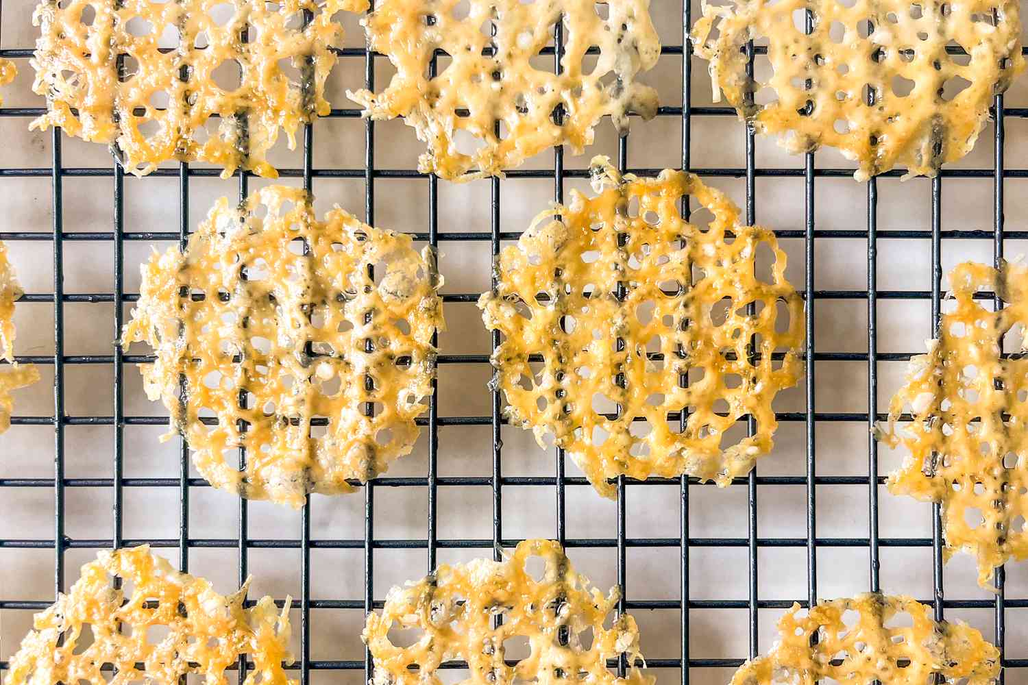 Parmesan crisps on a cooling rack